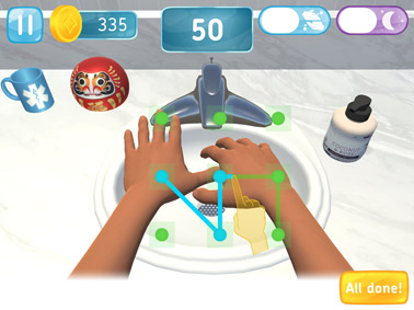 In Bubble Beats, players position the hands for each scrub step by tracing a symbol on the touchscreen interface. This screenshot shows the right hand moving closer to the left, and beginning to curl the fingers around the left thumb.