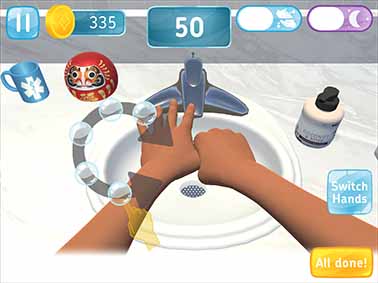 Bubble Beats exercises all 12 scrub steps of the World Health Organization's hand hygiene training. In this image, the hands are in position for the left thumb scrub step. A Scrub Track shaped like the letter 'C' will be used to move the hands through the proper scrubbing motion. Players trace their fingers along the scrub track using a touchscreen interface. As they pass through a series of bubbles laid out on the track, these bubbles pop, and the player earns points.