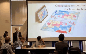 Screenshot 2025-10-17 at 114400 AM - Indelible Learning Dr. Jasminka Criley and Stuart Criley presenting Election Lab to classroom attendees.